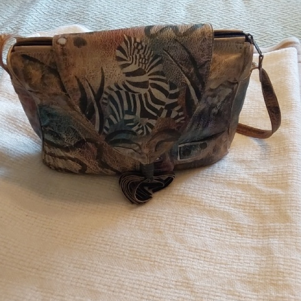 Brown and Black Zebra Print Shoulder Bag with Safari-Inspired Design